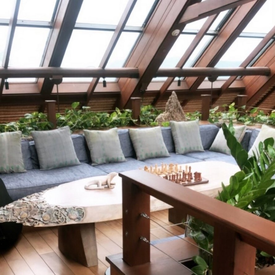 seating area with chess board and big windows